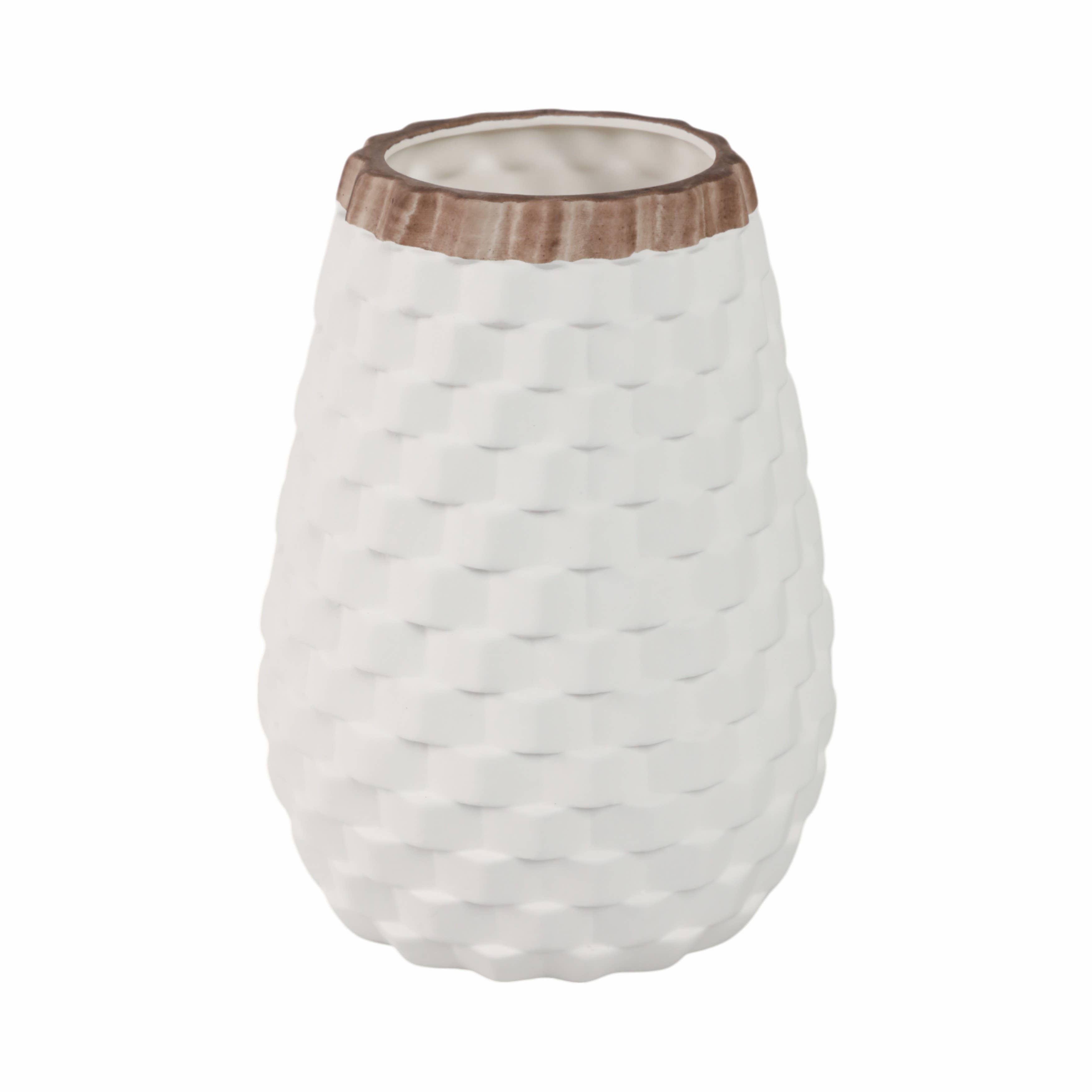 White textured vase with a wooden accent on a white background