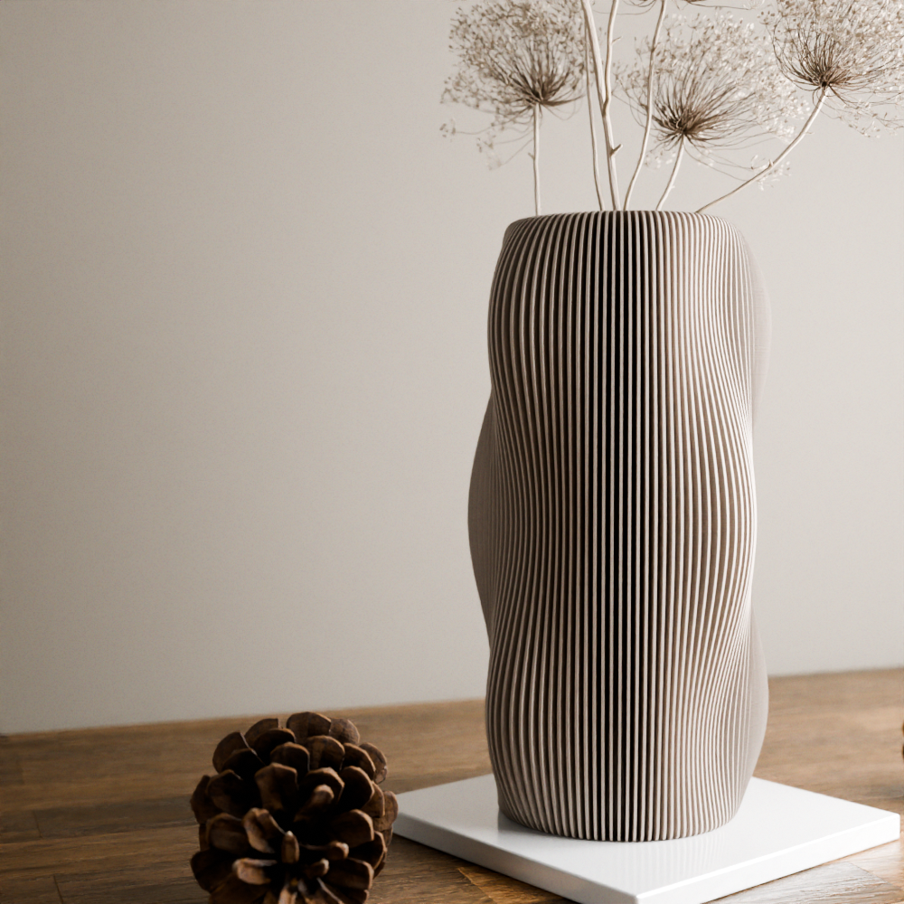 Decorative vase with wavy design on a wooden surface