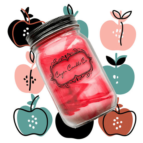 A glass mason jar candle with a black metal lid, filled with pink and red marbled wax. The label reads 'Cedar Candle Co.