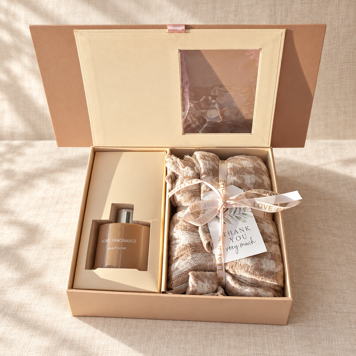 Reed diffuser gift set with scarf: open beige gift box with home fragrance diffuser and beige scarf tied with a Thank You tag