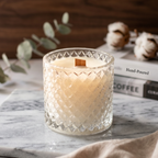 Handcrafted soy blend candle in textured diamond-cut crystal glass jar with natural wooden wick