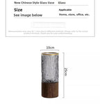 Ribbed glass vase on wooden base dimensions: 25 cm tall, 10 cm wide
