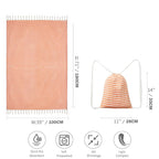 Orange Turkish peshtemal towel size guide: 39 by 71 inch towel with tassels and 11 by 14 inch drawstring bag, quick dry, prewashed, no shrinkage, light and compact